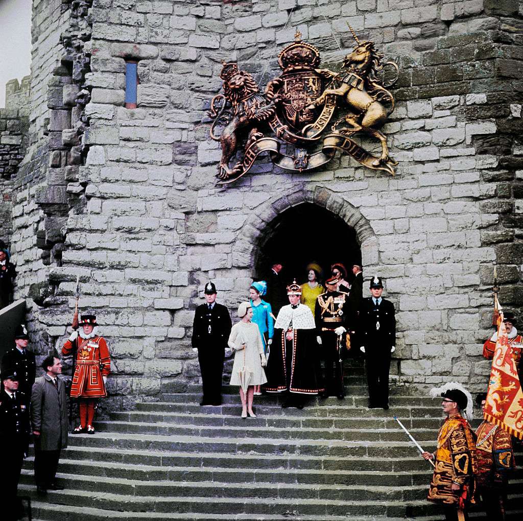 Royal Family Standing in Front of Building