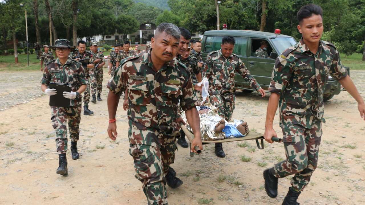 epa13193700 A handout photo made available by the Nepal Army shows army officers conducting a helicopter rescue of survivors following a flash flood in Trishuli Bazar, Nuwakot district, Nepal, 26 August 2026 (issued 27 August 2026). More than 150 people have died and hundreds remain missing across northern Nepal after a suspected avalanche triggered massive flash floods and mudslides along the Bhotekoshi and Trishuli river near the Nepal-Tibet border, causing widespread destruction to settlements and infrastructure, according to local authorities.  EPA/NEPAL ARMY / HANDOUT  HANDOUT EDITORIAL USE ONLY/NO SALES
