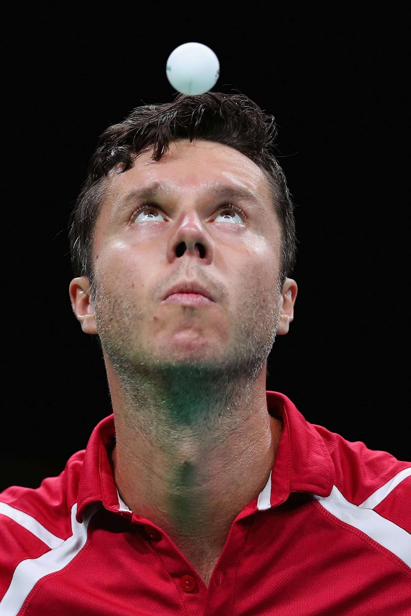 RIO DE JANEIRO, BRAZIL - AUGUST 09: Vladimir Samsonov of Belarus competes against Dimitrij Ovtcharov of Germany during the Men's Singles Quarterfinal 3 Table Tennis on Day 4 of the Rio 2016 Olympic Games at the Riocentro Pavilion 3 on August 9, 2016 in Rio de Janeiro, Brazil. (Photo by Tom Pennington/Getty Images)