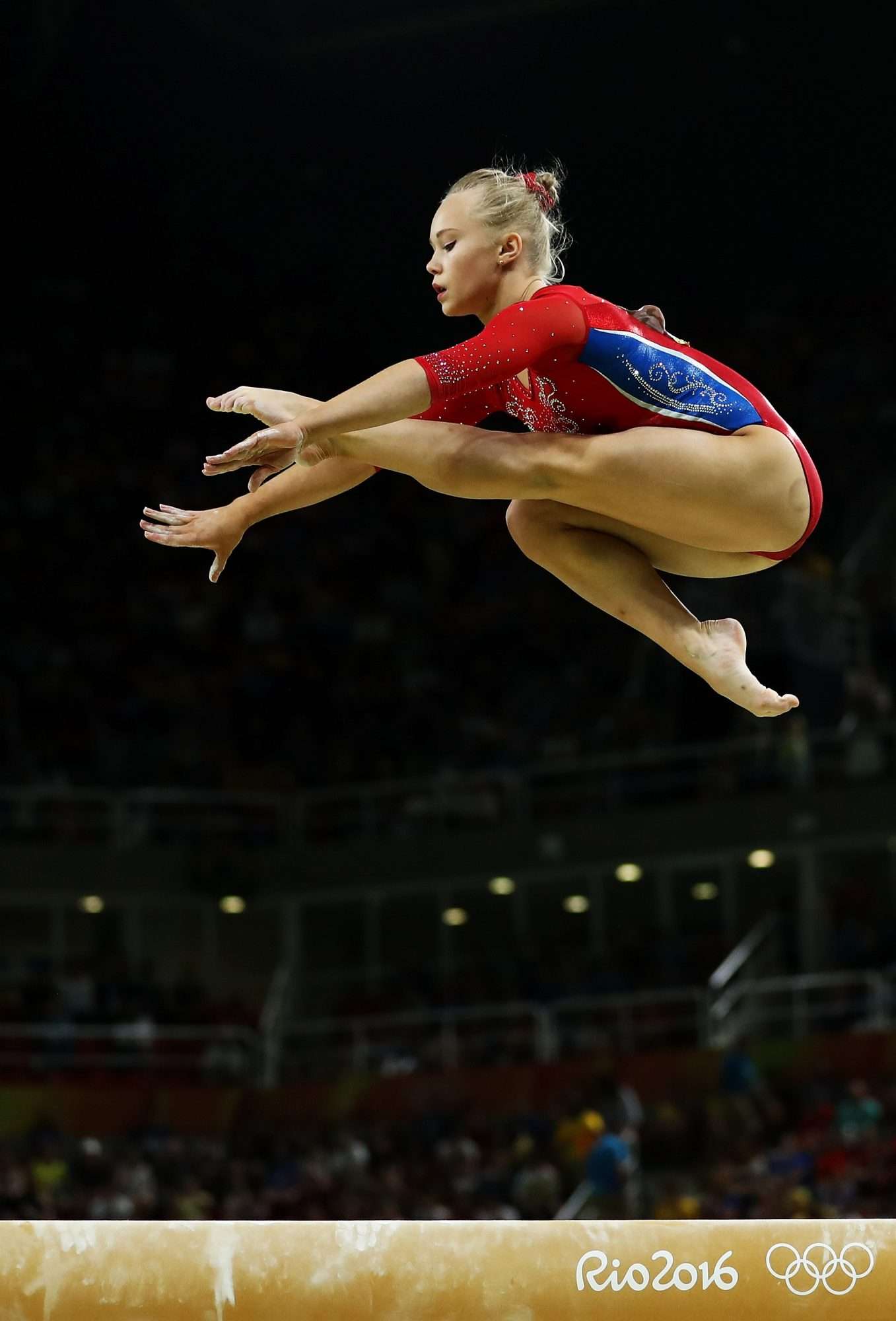 RIO DE JANEIRO, BRAZIL - AUGUST 09: Angelina Melnikova of Russia competes on the balance beam during the Artistic Gymnastics Women's Team Final on Day 4 of the Rio 2016 Olympic Games at the Rio Olympic Arena on August 9, 2016 in Rio de Janeiro, Brazil. (Photo by Lars Baron/Getty Images)