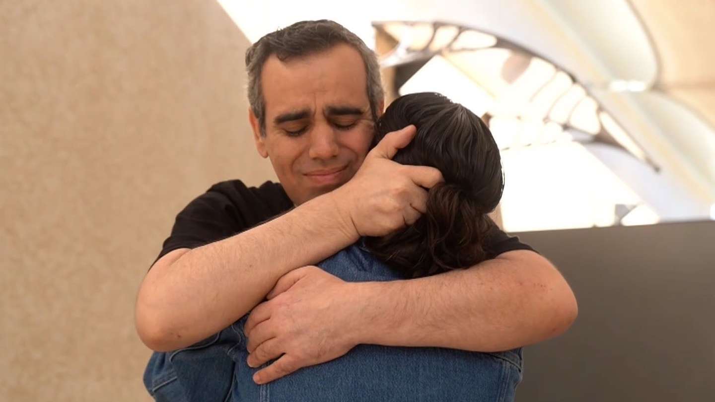 Returned hostage Omari Miran reuniting with his wife Lishay Miran-Lavi for the first time in 738 days on Oct 13, 2025. (GPO handout photo)