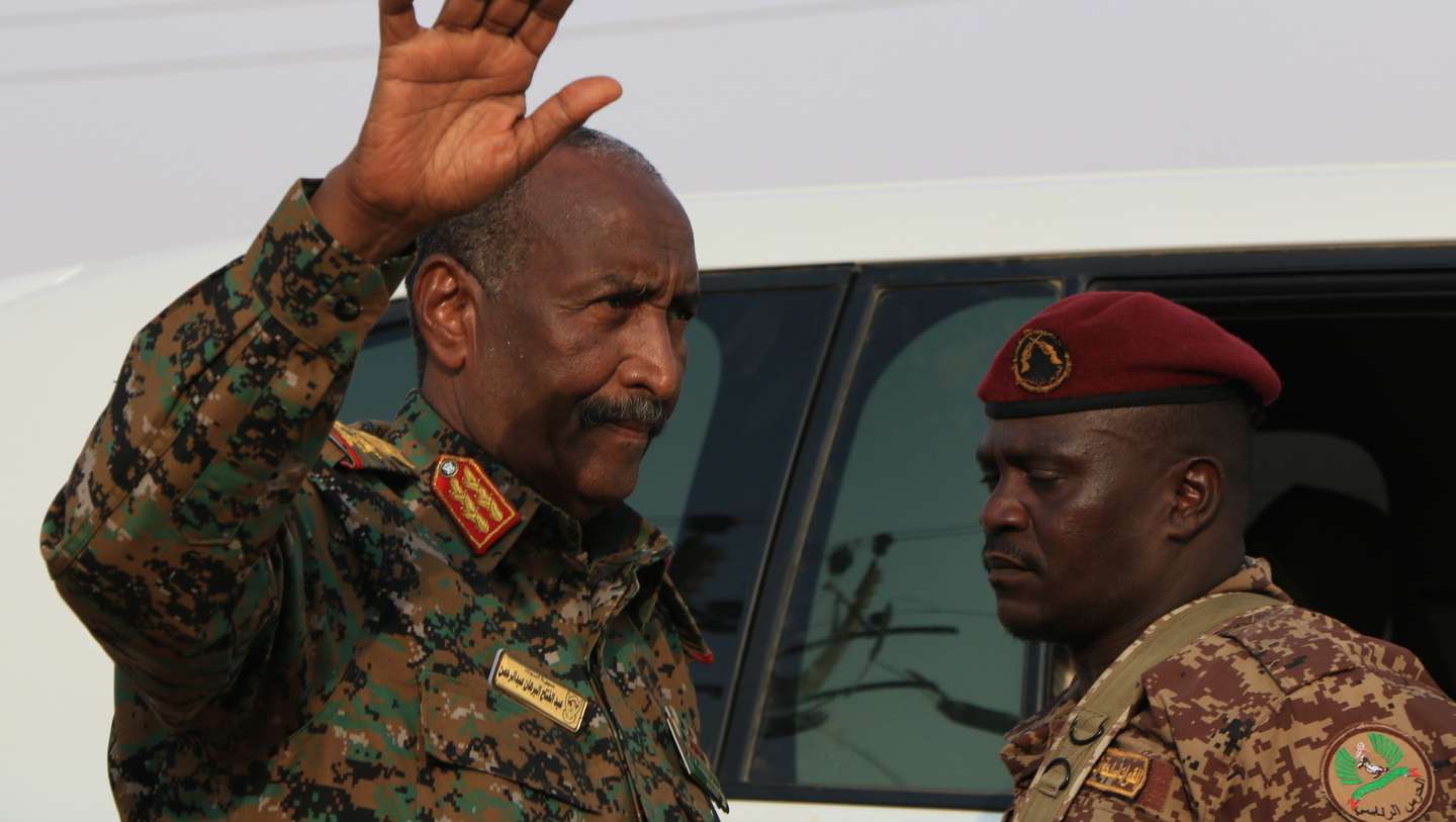 epa11571600 Sudan's President of the Transitional Sovereign Council Abdel-Fattah Al-Burhan Abdelrahman Al-Burhan (L) greets people as he visits a flood-affected area in Masawi, the northern state of Merowe, Sudan, 29 August 2024. At least 148 people have died in Sudan due to flooding and heavy rains, according to a Sudan's Health Ministry statement on 26 August 2024. A total of 31,666 families and 129,650 individuals were affected by the flooding in ten states, the statement reads. Over 12,400 homes have completely collapsed and 11,472 partially damaged mainly in the Sudanese Northern and River Nile states.  EPA/STR