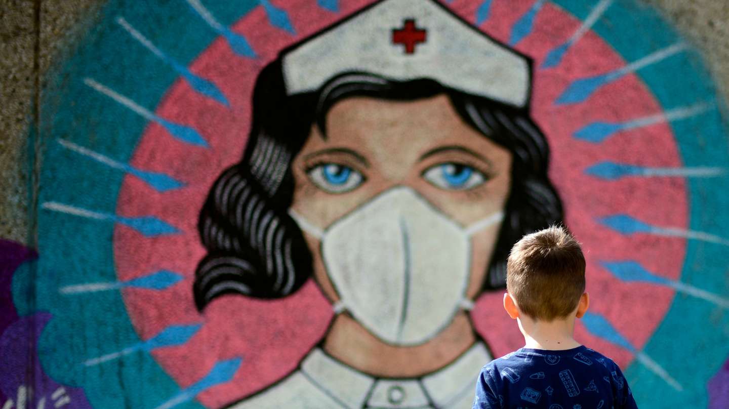 TOPSHOT-GERMANY-HEALTH-VIRUS-STREETART