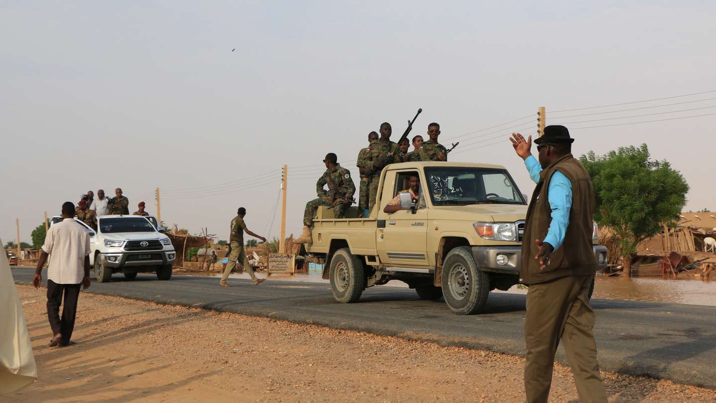 epa11571603 A convoy carrying Sudan's President of the Transitional Sovereign Council Abdel-Fattah Al-Burhan Abdelrahman Al-Burhan (not pictured) arrive as he visits a flood-affected area in Masawi, the northern state of Merowe, Sudan, 29 August 2024. At least 148 people have died in Sudan due to flooding and heavy rains, according to a Sudan's Health Ministry statement on 26 August 2024. A total of 31,666 families and 129,650 individuals were affected by the flooding in ten states, the statement reads. Over 12,400 homes have completely collapsed and 11,472 partially damaged mainly in the Sudanese Northern and River Nile states.  EPA/STR