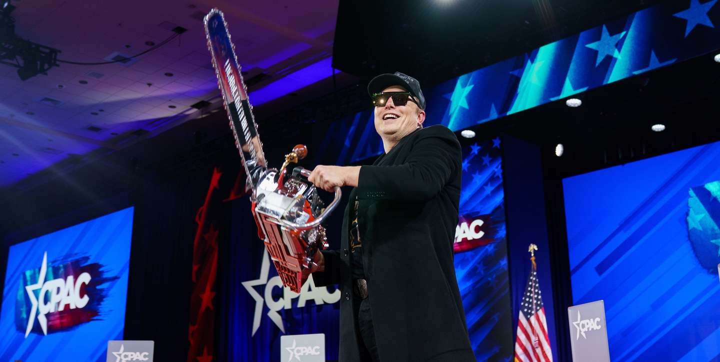 epa11911595 US entrepreneur and US special government employee Elon Musk with a chainsaw given to him by Argentine President Javier Milei at the Conservative Political Action Conference (CPAC) 2025 at National Harbor, Maryland, USA, 20 February 2025. The Conservative Political Action Conference is an annual political conference attended by conservative activists and elected officials from across the United States and beyond.  EPA/WILL OLIVER / POOL