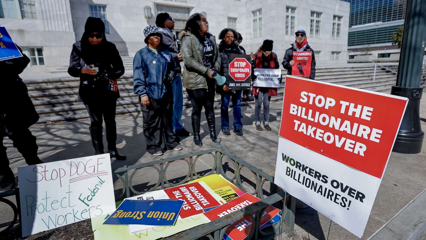 epa11913743 A small group of labor organizations rally in support of fired US federal employees outside the Martin Luther King Jr Federal Building in Atlanta, Georgia, USA, 21 February 2025. The Trump administration and the Elon Musk led Department of Government Efficiency, have announced thousands of US federal job cuts across most departments of the US government.  EPA/ERIK S. LESSER