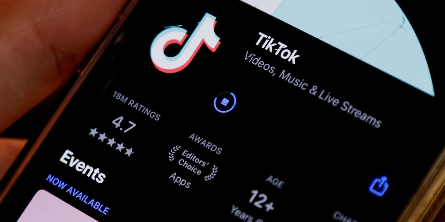 epa11831679 An iPhone user with the TikTok app in the Apple App Store, in Avondale Estates, Georgia, USA, 17 January 2025. The US Supreme Court has backed a law banning the Chinese-owned TikTok app in the United States unless it is sold to a US-based company 19 January 2025.  EPA/ERIK S. LESSER