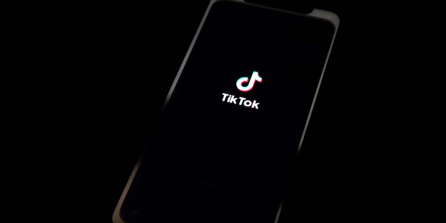 epa08685858 A generic illustration shows the logo of Chinese internet media app TikTok on a phone, in Beijing, China, 21 September 2020.  Chinese-owned mobile app WeChat was set to stop operation in the U.S. on midnight 20 September 2020.  EPA/ROMAN PILIPEY