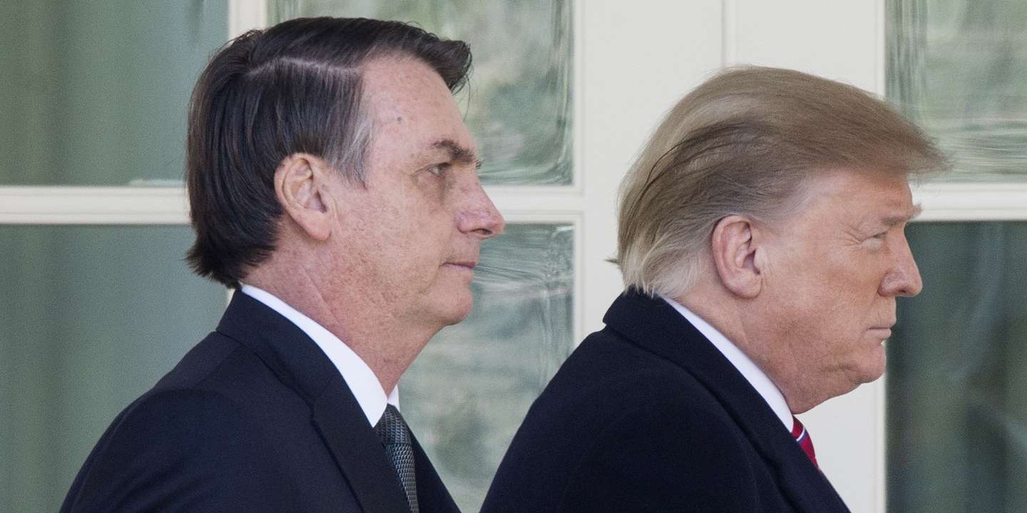 epa08939614 (FILE) US President Donald J. Trump (R) and Brazilian President Jair Bolsonaro (L) walk down the Colonnade to hold a joint news conference in the Rose Garden of the White House in Washington, DC, USA, 19 March 2019. Bolsonaro, a right-wing nationalist who earned the nickname the 'Trump of the Tropics,' met with President Trump for bilateral negotiations and a joint press conference. The presidency of Donald Trump, which records two impeachments, will end at noon on 20 January 2021.  EPA/MICHAEL REYNOLDS *** Local Caption *** 55069012