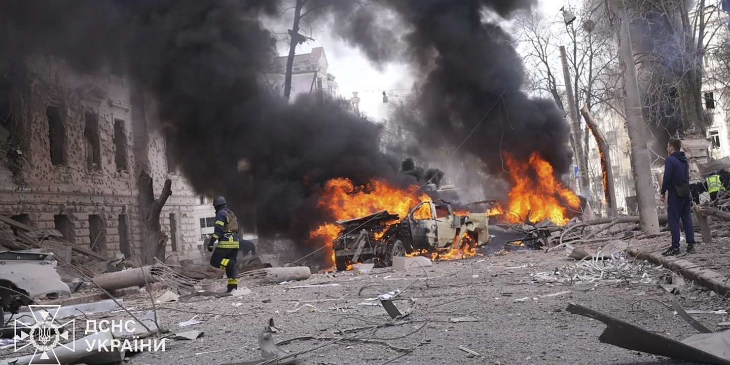 epa12029030 A handout photo made available by the State Emergency Service of Ukraine (SES) shows Ukrainian rescuers working at the site of a rocket strike in downtown Sumy, Ukraine, 13 April 2025, amid the ongoing Russian invasion. At least 31 people were killed, including two children, and 84 people were injured, including 10 children, after a Russian rocket hit downtown Sumy in the morning, according to a report by the State Emergency Service.  EPA/STATE EMERGENCY SERVICE OF UKRAINE HANDOUT  HANDOUT EDITORIAL USE ONLY/NO SALES