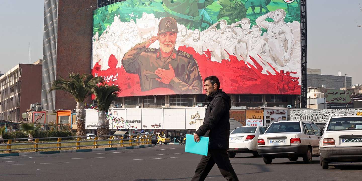 epaselect epa12630231 A person walks past a billboard depicting former Iran Islamic Revolutionary Guard Corps (IRGC) Quds Force commander Qasem Soleimani in downtown Tehran, Iran, 06 January 2026. The country is facing a wave of anti-government protests amid a deepening economic crisis, fueled by rising prices of basic goods and a sharp decline in the national currency, driven by regional tensions with Israel and the US, as well as longstanding US and EU sanctions.  EPA/ABEDIN TAHERKENAREH