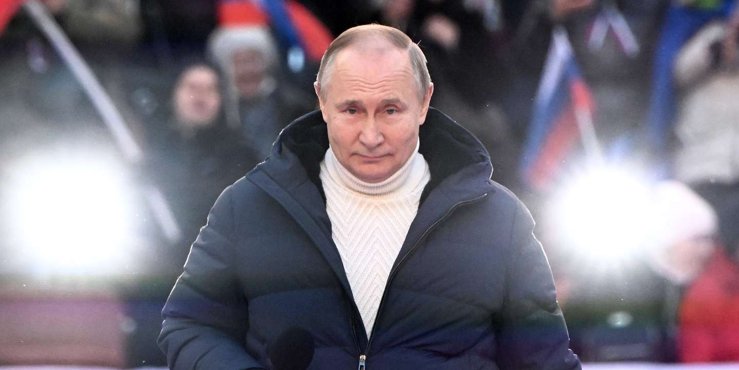 epa09833831 Russian President Vladimir Putin attends a concert marking the 8th anniversary of Crimea's reunification with Russia at the Luzhniki stadium in Moscow, Russia, 18 March 2022.  Russia in 2014 annexed the Black Sea peninsula, shortly after Crimeans voted in a disputed referendum to secede from Ukraine.  EPA/SERGEI GUNEYEV / SPUTNIK POOL MANDATORY CREDIT