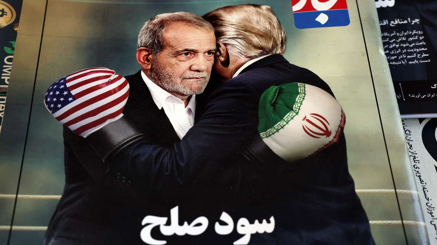 epa12153515 A copy of the Iranian magazine Tejarat Farda, titled 'The benefit of peace,' features an image of Iranian President Masoud Pezeshkian and US President Donald Trump embracing while wearing boxing gloves at a kiosk in Tehran, Iran, 03 June 2025. On 02 June 2025, Trump stated he ruled out allowing Iran to enrich uranium under a potential new nuclear deal between Iran and the US. According to the IRNA news agency, Pezeshkian said on 03 June 2025, that Iran would not accept this condition and would not relinquish its peaceful right to enrich uranium.  EPA/ABEDIN TAHERKENAREH