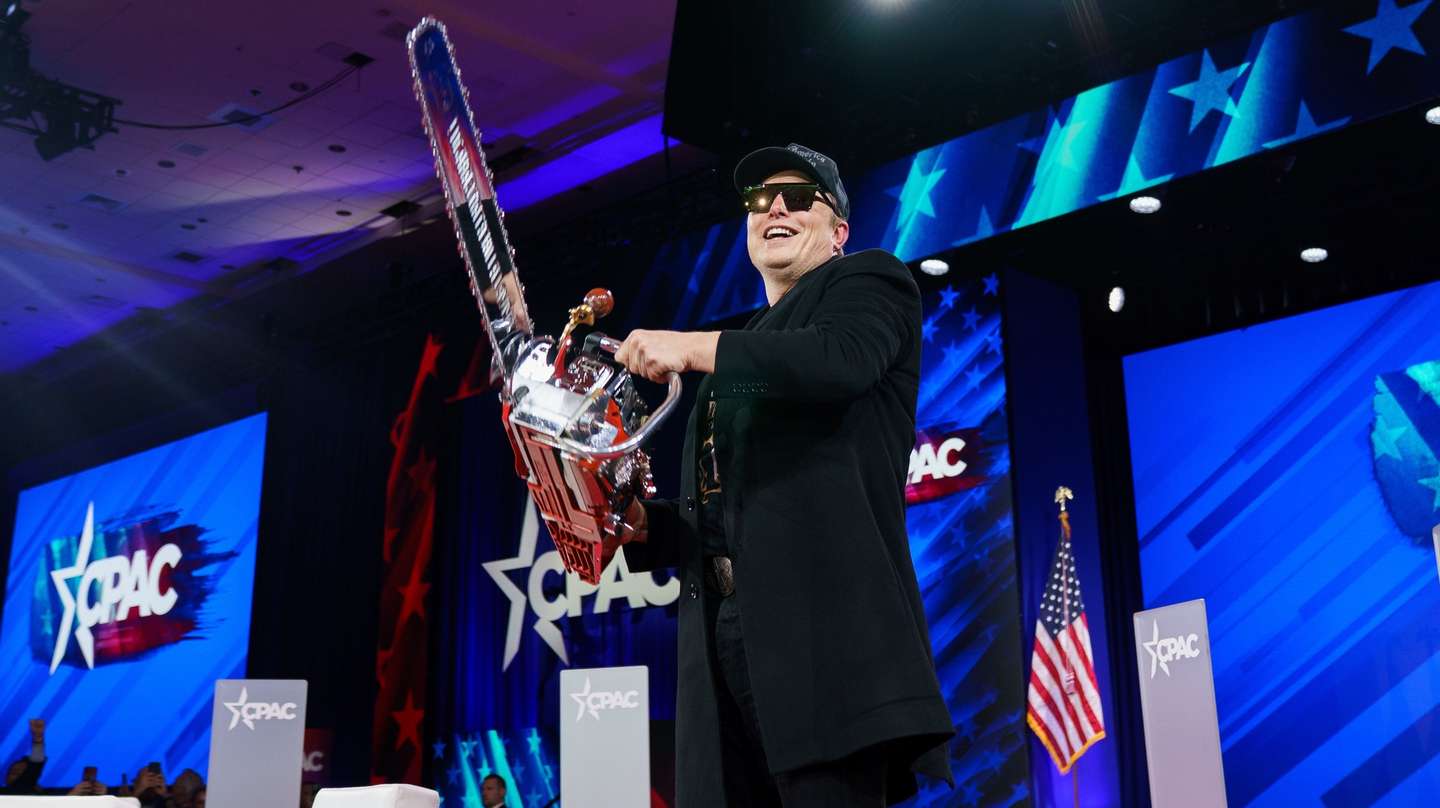 epa11911595 US entrepreneur and US special government employee Elon Musk with a chainsaw given to him by Argentine President Javier Milei at the Conservative Political Action Conference (CPAC) 2025 at National Harbor, Maryland, USA, 20 February 2025. The Conservative Political Action Conference is an annual political conference attended by conservative activists and elected officials from across the United States and beyond.  EPA/WILL OLIVER / POOL