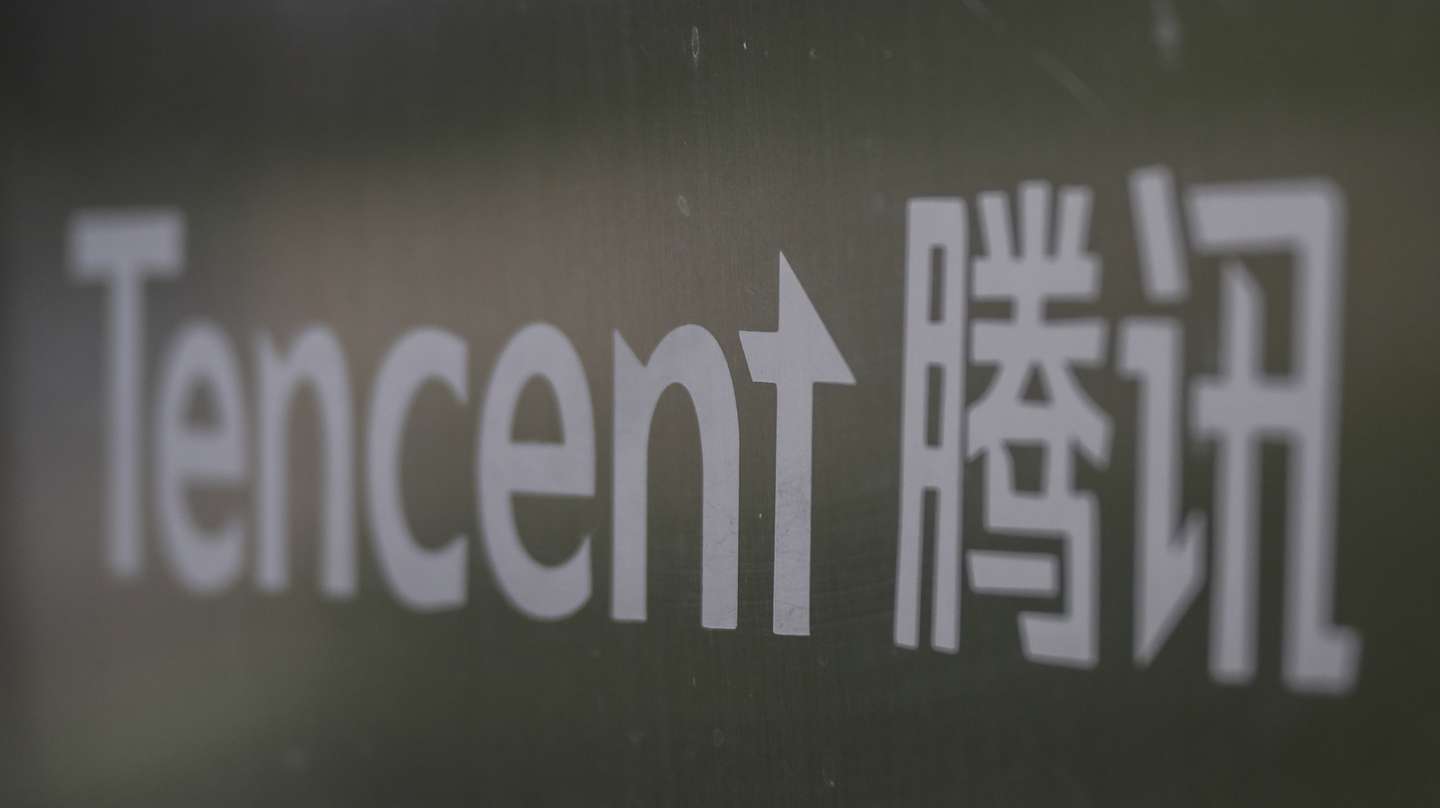 epa08921399 (FILE) - A sign hangs outside the headquarters of Tencent, the parent company of Chinese social media giant WeChat, in Beijing, China, 18 August 2020 (reissued 06 January 2021). On 05 January 2021 US President Donald Trump signed an executive order banning transactions with eight Chinese-connected apps, including Alipay owned by Ant Group Co and other apps owned by Chinese tech giant Tencent Holdings Ltd.  EPA/WU HONG