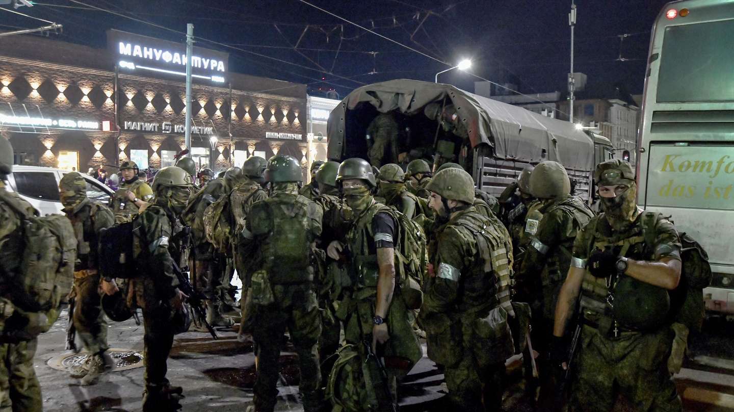 epa10710225 Private military company (PMC) Wagner Group servicemen prepare to leave downtown Rostov-on-Don, southern Russia, 24 June 2023. Security and armoured vehicles were deployed after the Chief of the private military company (PMC) Wagner Group said in a video that his troops had occupied the building of the headquarters of the Southern Military District, demanding a meeting with Russia's defense chiefs. The President of Belarus held talks with the head of the Wagner group, as a result of which he accepted a proposal to stop the movement of the group's fighters across Russia, the press service of the President of Belarus reported. The Chief of Wagner Group has said that columns of his group will return to field camps.  EPA/ARKADY BUDNITSKY