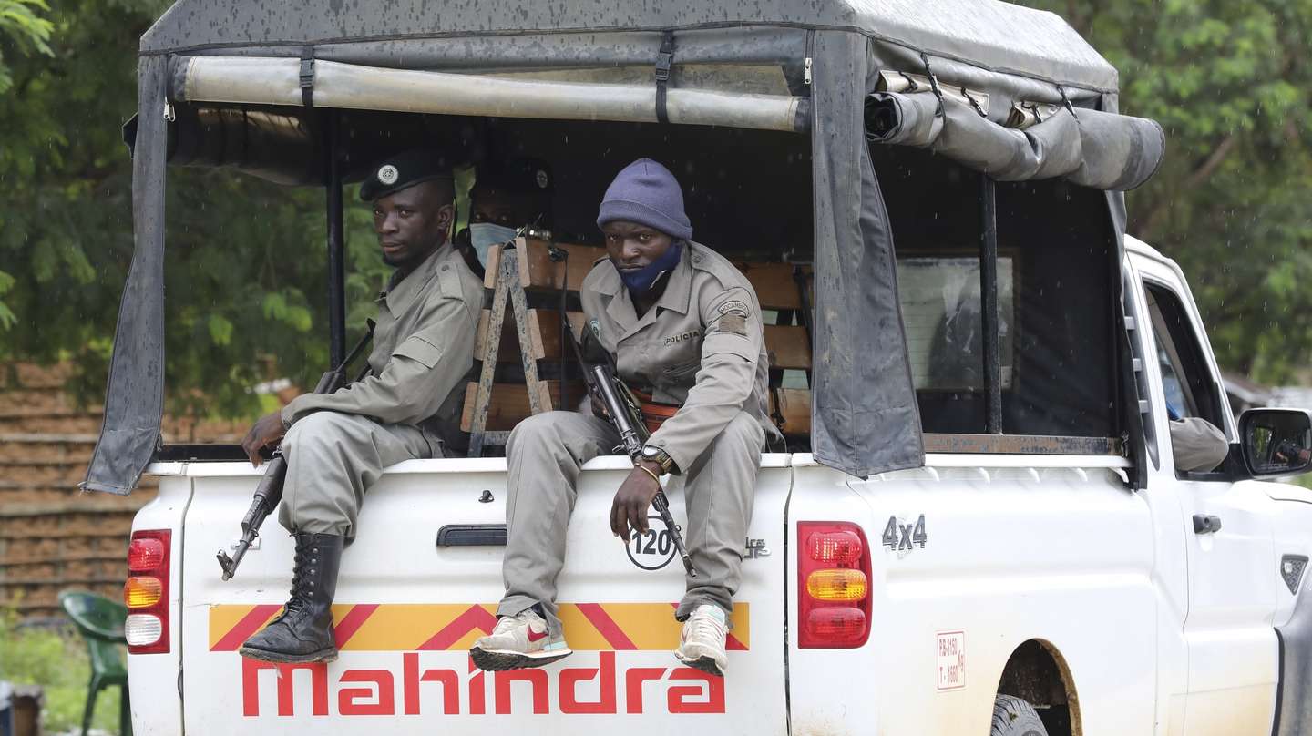 epa09131134 Mozambique army soldiers patrol the streets of Palma, Cabo Delgado, Mozambique, 12 April 2021. The violence unleashed more than three years ago in Cabo Delgado province escalated again about two weeks ago, when armed groups first attacked the town of Palma.  EPA/JOAO RELVAS