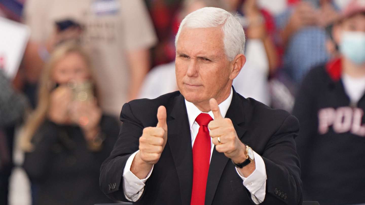 epa08863022 US Vice President Mike Pence participates in a campaign rally to support the runoff election of Georgia Republican Senators David Perdue and Kelly Loeffler at Savannah/Hilton Head International Airport in Savannah, Georgia, USA, 04 December 2020. Perdue faces Democrat John Ossoff and Loeffler faces Reverend Rafael Warnock in the 05 January 2021 runoff election.  EPA/RICHARD ELLIS