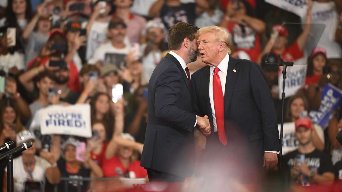 epa11523819 Republican presidential candidate Donald J. Trump (R) and Republican vice presidential candidate Senator JD Vance (L) of Ohio appear on stage during a campaign rally at the Georgia State Convocation Center in Atlanta, Georgia, USA, 03 August 2024.  EPA/EDWARD M. PIO RODA