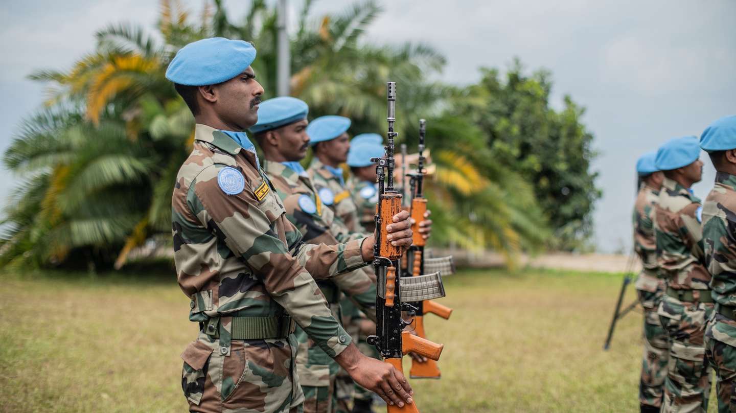 epa10101378 United Nations (UN) personnel during a ceremony to pay tribute to UN peacekeepers killed during a protest in Butembo in Goma, Democratic Republic of Congo (DRC), 01 August 2022. The tribute ceremony was for UN peacekeepers that were killed during anti-UN protests in eastern Democratic Republic of Congo following more than a week of protests against the UN peacekeeping mission in DRC, Monusco.  The UN Under-Secretary-General for Peace Operations Jean-Pierre Lacroix attended the ceremony. The ceremony comes one day following UN peacekeepers allegedly opening fire and killing two residents in Kasindi, a border town with Uganda.  EPA/STR