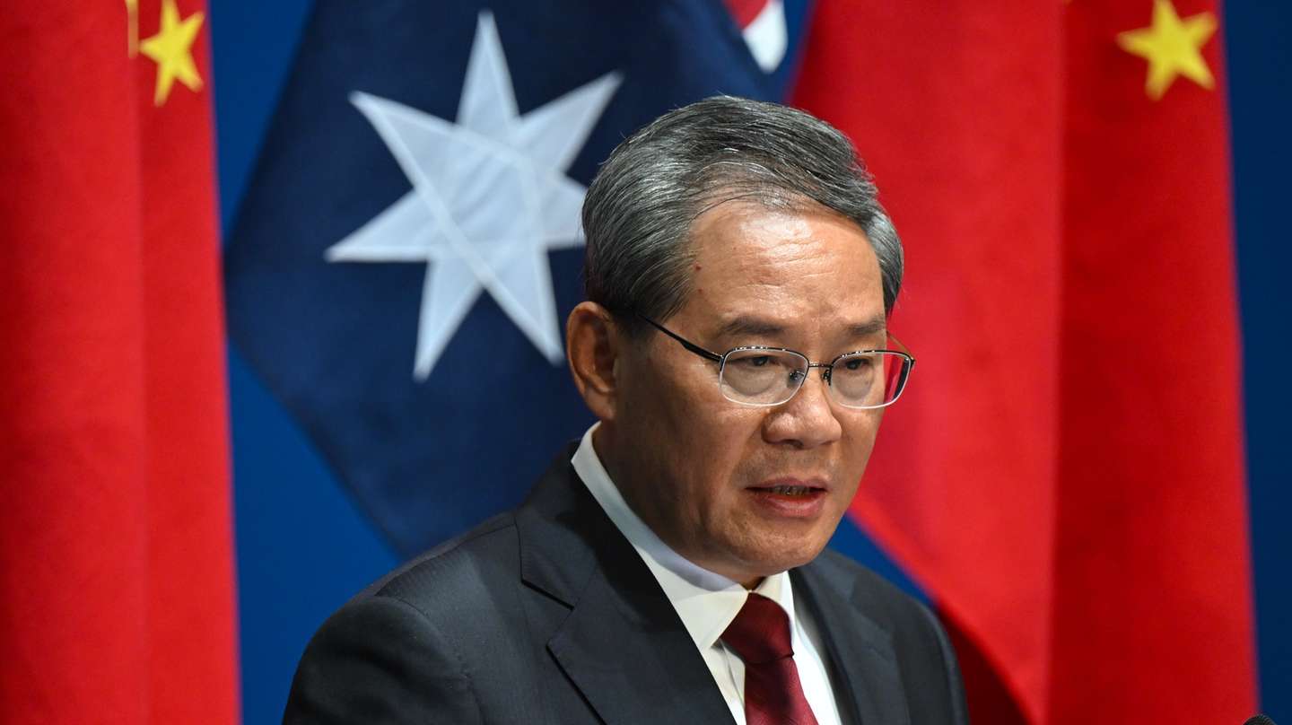 epa11417000 Chinese Premier Li Qiang speaks to the media during a signing ceremony at the Australian Parliament House in Canberra, Australia, 17 June 2024. Li Qiang, who is second only to President Xi Jinping, is on a four-day visit to Australia.  EPA/LUKAS COCH AUSTRALIA AND NEW ZEALAND OUT