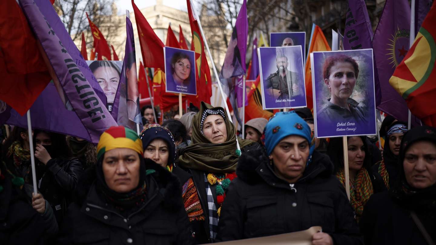epa10394170 Members of the Kurdish community take part in a demonstration marking the 10th anniversary of the killing of three Kurdistan Workers Party (PKK) members in Paris, France, 07 January 2023. Three Kurdish women, including the founding member of the PKK, were shot dead at a community center in Paris on 10 January 2013. The commemoration comes a few days after a gunman opened fire outside a Kurdish cultural center in central Paris on 23 December 2022, killing three people.  EPA/YOAN VALAT