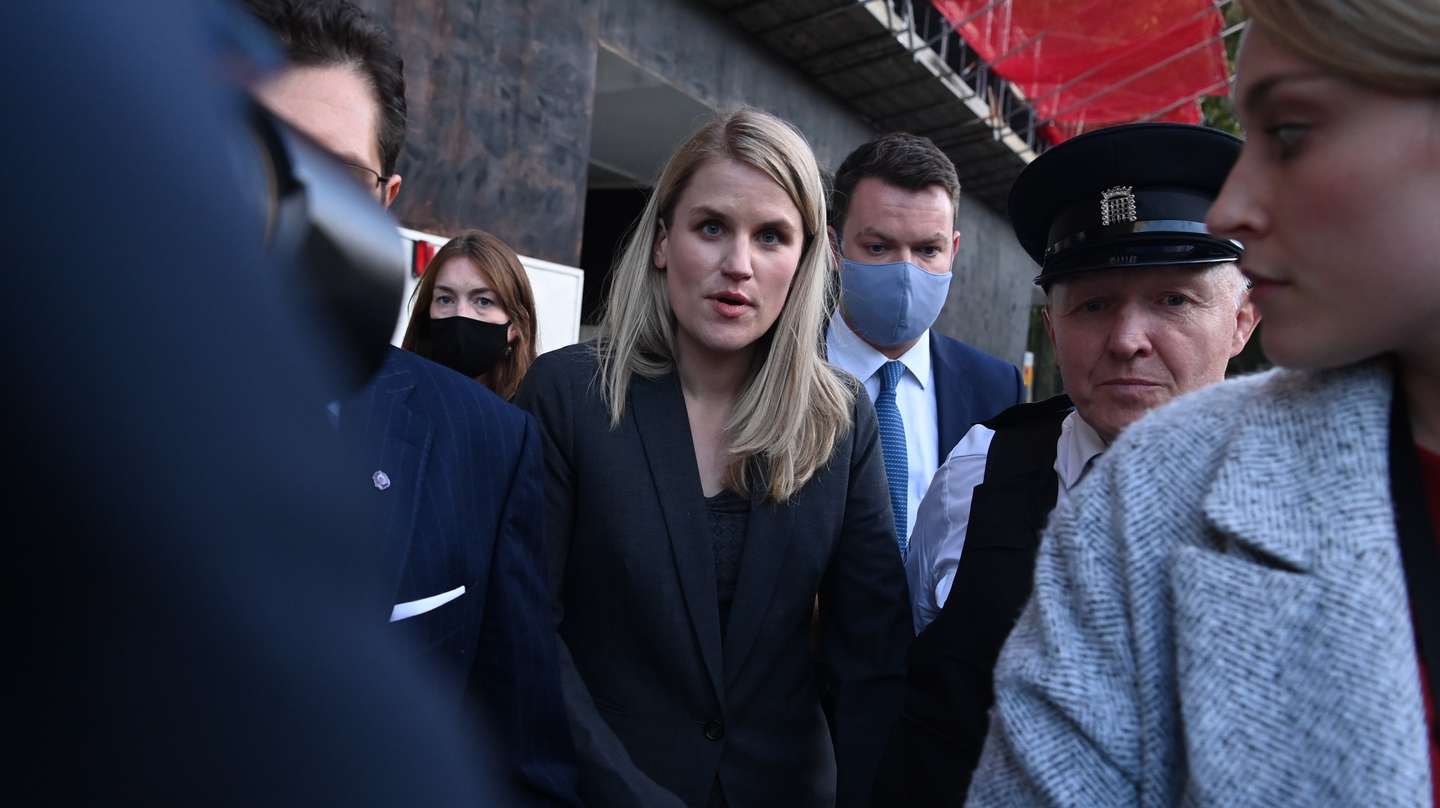epa09545698 Facebook whistleblower Frances Haugen (C) leaves the Houses of Parliament in London, Britain 25 October 2021. Frances Haugen was giving evidence to members of the UK parliament on the Joint Committee on the draft Online Safety Bill.  EPA/FACUNDO ARRIZABALAGA