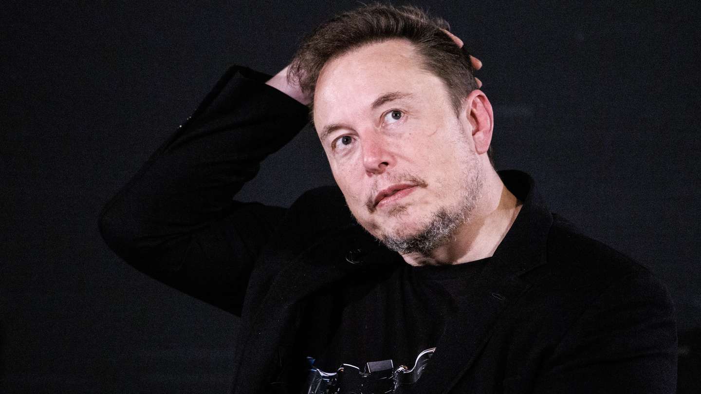 epaselect epa10955397 US tech entrepreneur Elon Musk, owner of Tesla, SpaceX and X, gestures as he attends a conversation event with British Prime Minister Rishi Sunak (unseen) in central London, Britain, 02 November 2023. The conversation will be streamed on X (formerly Twitter) and follows the two-day AI Safety Summit that was held at Bletchley Park.  EPA/TOLGA AKMEN / POOL