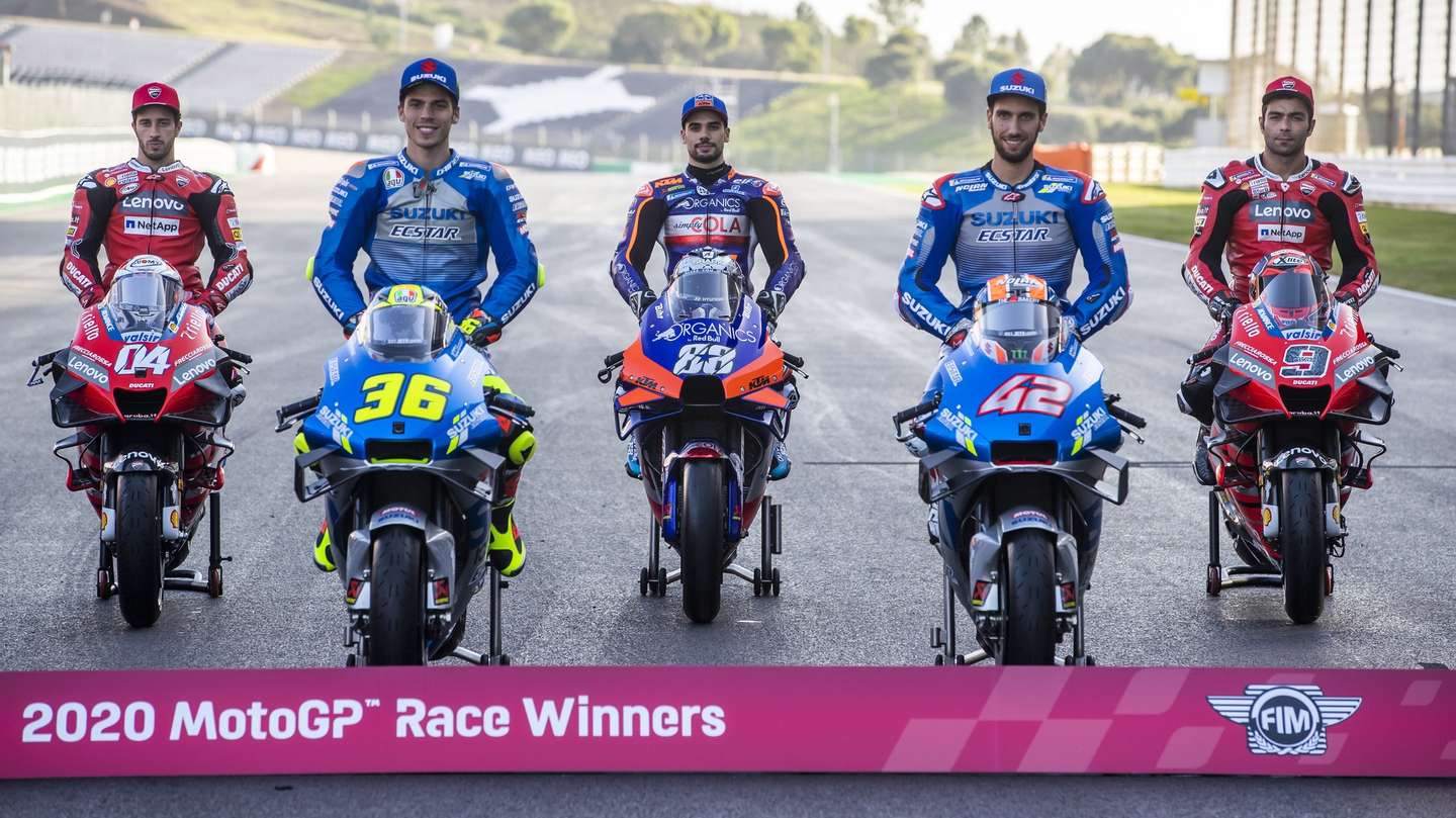 epa08829473 (L-R) Italian rider Andrea Dovizioso of Ducati team, spanish rider and 2020 Moto GP World Champion Joan Mir, portuguese rider Miguel Oliveira of  KTM Tech 3, spanish rider Alex Rins of Suzuki Ecstar team, italian rider Danilo Petrucci of Ducati team and french rider Fabio Qaurtararo of Petronas Yamaha SRT tem, during a photoshoot with all the 2020 MotoGP race winners ahead the the Motorcycling Grand Prix of Portugal at Algarve International race track, south of Portugal, 19 November 2020. The Motorcycling Grand Prix of Portugal will take place on 22 November 2020.  EPA/JOSE SENA GOULAO