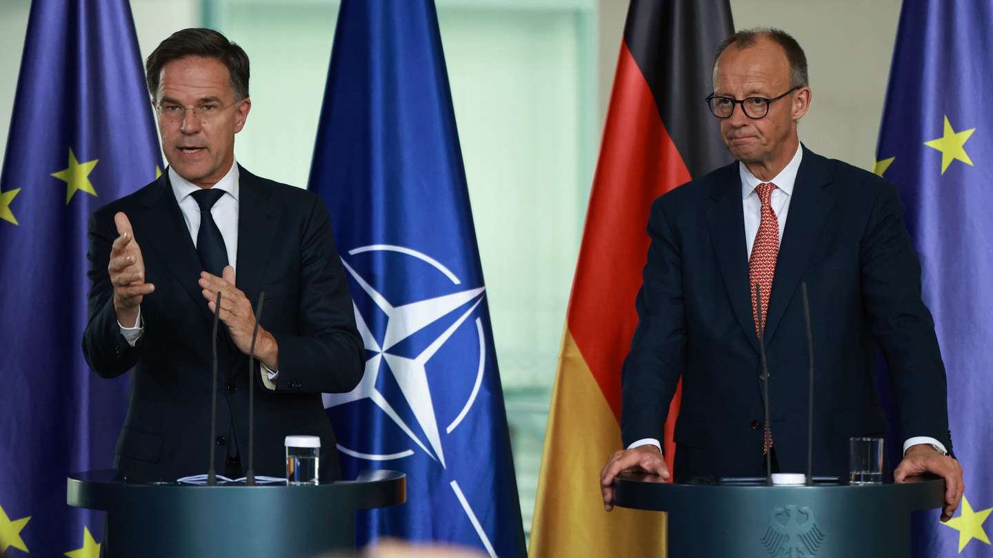 epa12227077 German Chancellor Friedrich Merz (R) and NATO Secretary-General Mark Rutte (L) attend a press conference at the Chancellery in Berlin, Germany, 09 July 2025.  EPA/CLEMENS BILAN