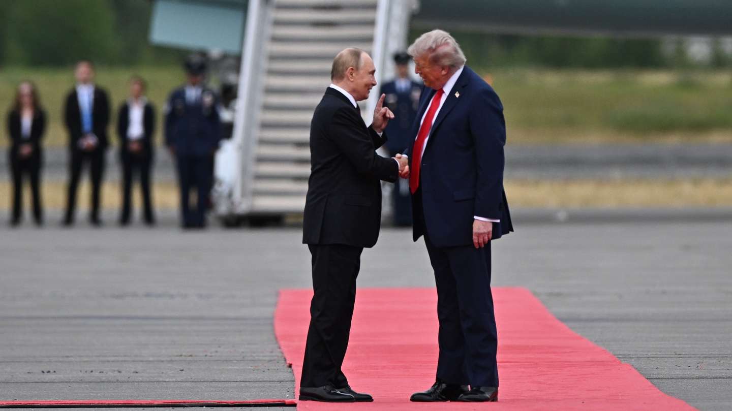 epaselect epa12303523 US President Donald Trump (R) welcomes Russian President Vladimir Putin during their meet to negotiate at Joint Base Elmendorf-Richardson in Anchorage, Alaska, USA, 15 August 2025.  EPA/SERGEY BOBYLEV/SPUTNIK/KREMLIN POOL / POOL MANDATORY CREDIT
