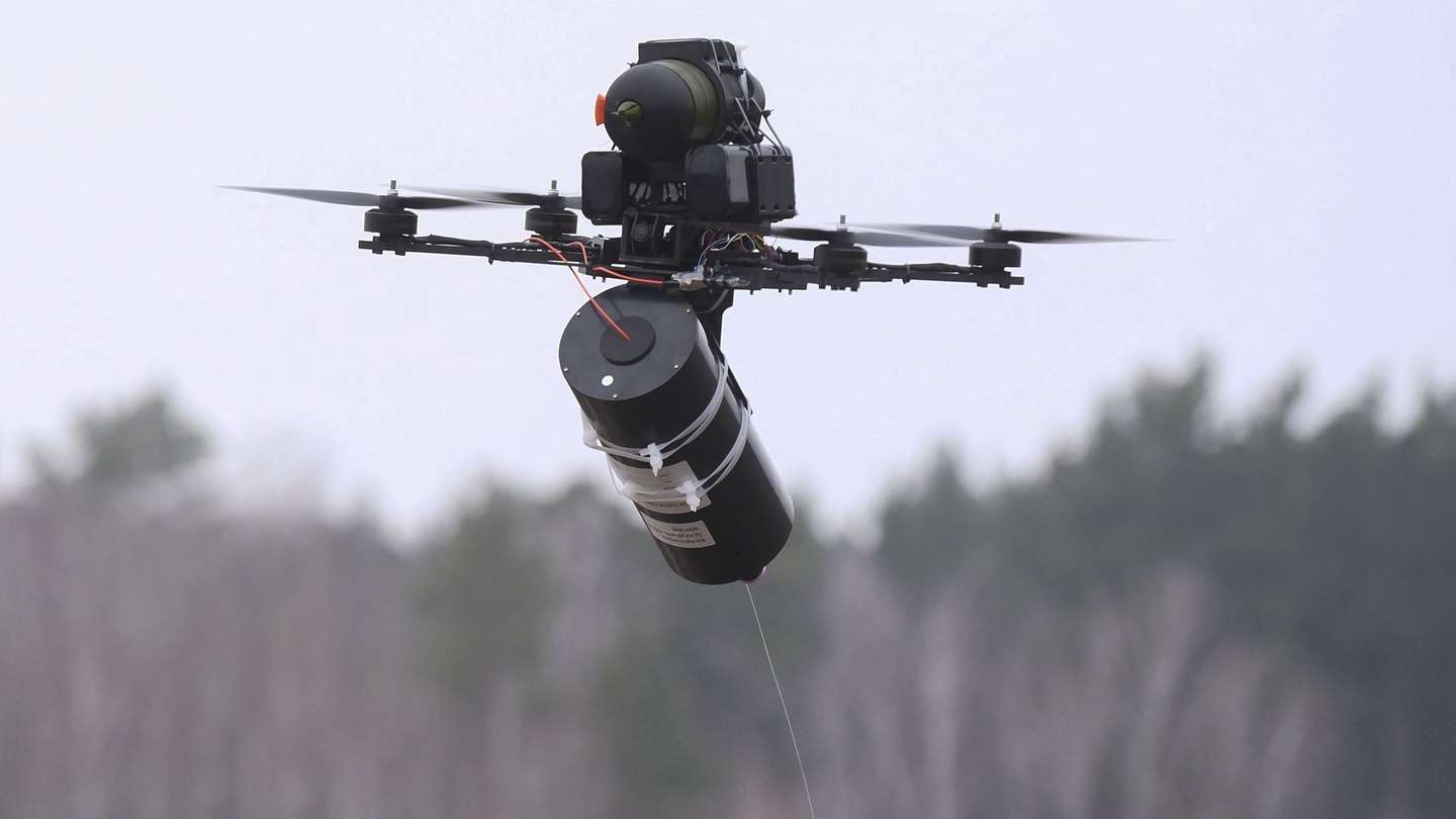 epa11861189 A fiber-optic-controlled drone designed for the Ukrainian Armed Forces, near Kyiv, Ukraine, 29 January 2025. Drones controlled by fiber optics can infiltrate enemy lines undetected by electronic warfare devices, and engage targets from outside the enemy's line of sight.  EPA/VITALII NOSACH