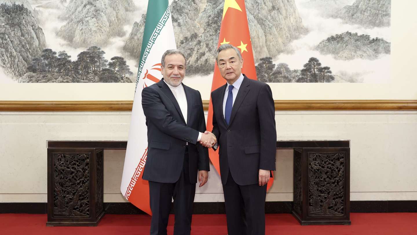 epa12049474 Chinese Foreign Minister Wang Yi (R), also a member of the Political Bureau of the Communist Party of China Central Committee, holds talks with Iranian Foreign Minister Seyed Abbas Araghchi in Beijing, China, 23 April 2025.  EPA/XINHUA / DING HAITAO CHINA OUT / UK AND IRELAND OUT  /       MANDATORY CREDIT EDITORIAL USE ONLY
