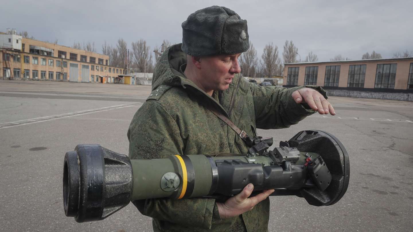 epa09853406 A serviceman of the self-proclaimed Luhansk People's Republic (LPR) shows NLAW Swidish-UK made Light Anti-tank weapon that was abandoned by Ukrainian army during their retreat in Luhansk region, in Luhansk, Ukraine, 27 March 2022. Over the past two weeks, the US has donated $300 million worth of military aid to Ukrainians. Canada and the UK have said they will continue to supply arms to Ukraine. On 24 February Russian troops had entered Ukrainian territory in what the Russian president declared a 'special military operation', resulting in fighting and destruction in the country, a huge flow of refugees, and multiple sanctions against Russia.  EPA/SERGEI ILNITSKY