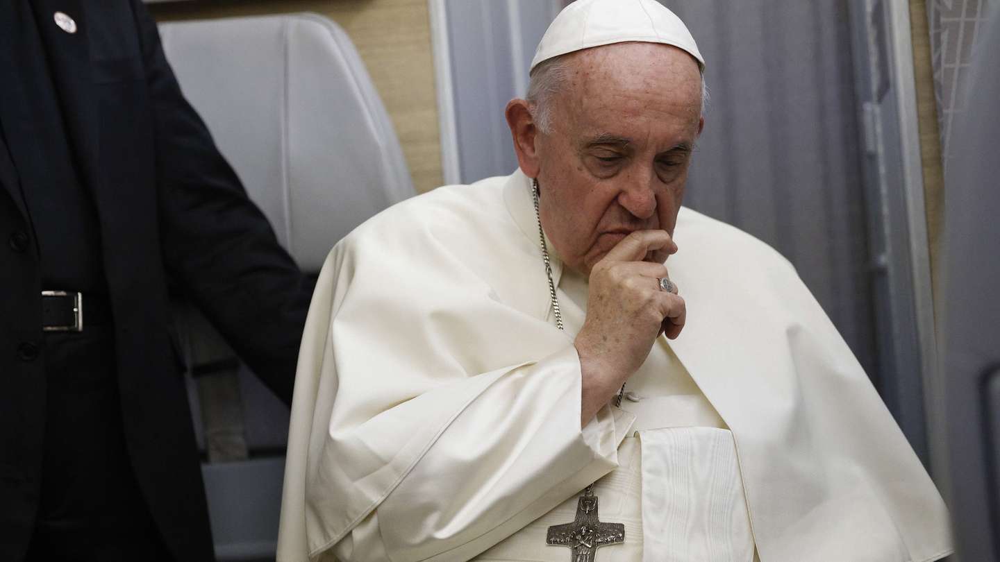 epa10098165 Pope Francis holds a news conference aboard the papal plane on his flight back after visiting Canada, 30 July 2022.  EPA/GUGLIELMO MANGIAPANE / POOL