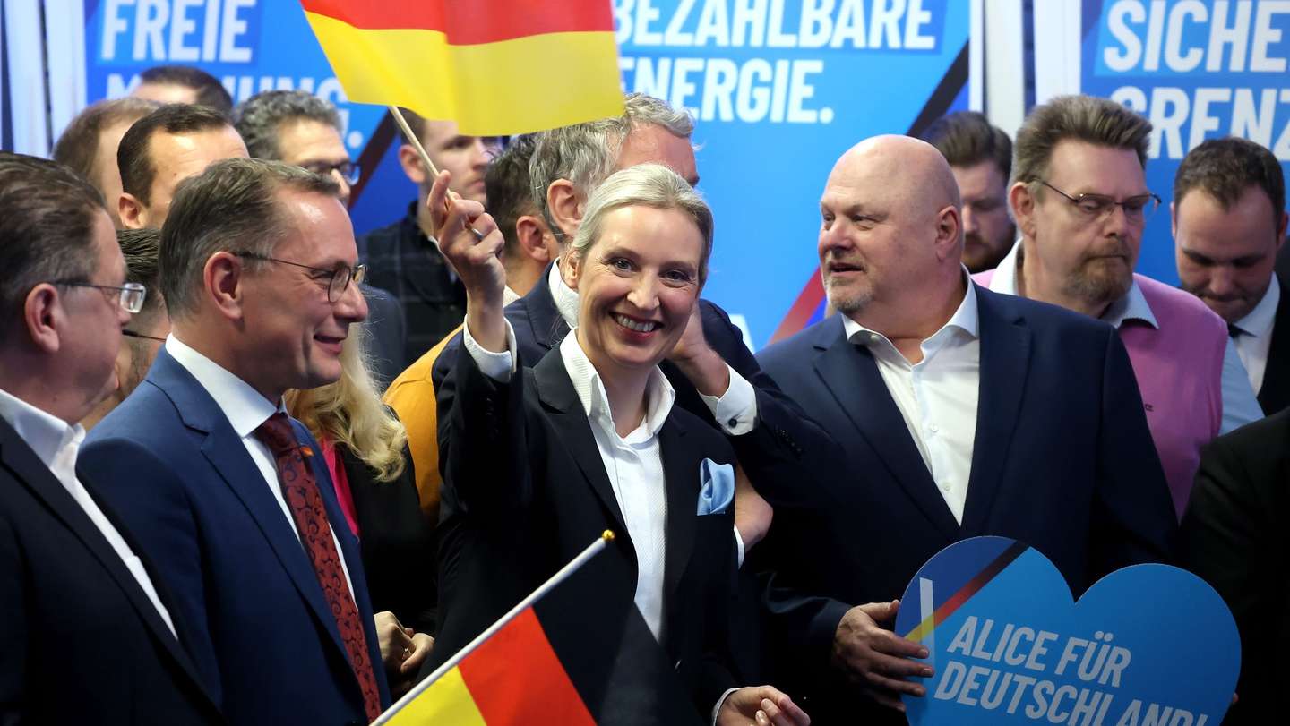 epa11918933 Alternative for Germany (AfD) party and faction co-chairwoman and top candidate for the federal election Alice Weidel (C) reacts to initial results during the Alternative for Germany (AfD) election event in Berlin, Germany, 23 February 2025. About 60 million Germans were eligible to vote in the elections for a new federal parliament, the 20th Bundestag.  EPA/FILIP SINGER