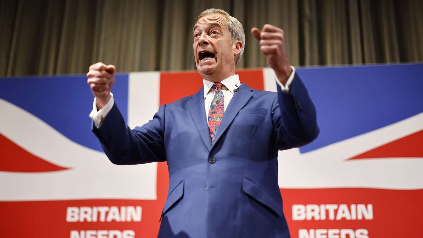 epaselect epa11379338 Honorary President of Reform UK Nigel Farage gestures while speaking at a press conference for the Reform UK party at the Glaziers Hall, London, Britain, 30 May 2024. Britain will hold a snap general election on 04 July 2024.  EPA/TOLGA AKMEN