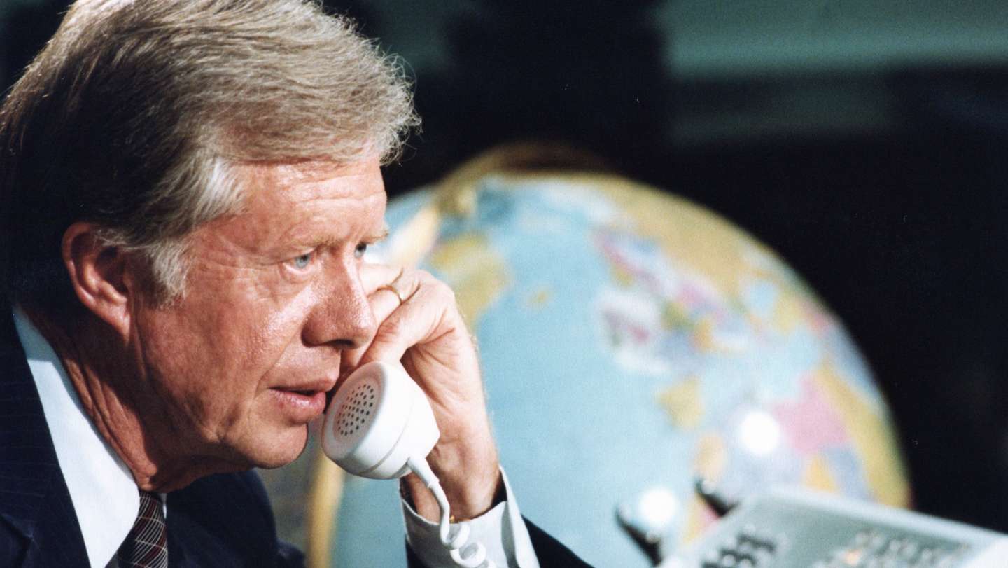 epa11798063 (FILE) A handout photo made available by the Jimmy Carter Library shows US President Jimmy Carter making a telephone call from the Oval Office at The White House in Washington, DC, USA, 07 August 1980 (reissued 29 December 2024). Carter died on 29 December 2024 at his home in Plains, Georgia, The Carter Center confirmed. He was 100, the longest-lived president in US history.  He took office as President of the United States on 20 January 1977 and succeeded Gerald Ford until he left office on 20 January 1981 to his successor Ronald Reagan. James Earl 'Jimmy' Carter, Jr. was born on 01 October 1924 in the village of Plains, Georgia, USA. After school he enrolled in the US Navy until 09 October 1953 after which he returned to his native village to extend the family peanut farm. In 1961 Jimmy Carter was elected to the state senate and on 12 January 1971 he became Governor of Georgia. In 2002 he became the only US President to receive the Nobel Peace Prize after leaving office. Outside of his political career Jimmy Carter was also known for his volunteer work with the 'Habitat for Humanity' organization.  EPA/WHITE HOUSE PHOTOGRAPHER / JIMMY CARTER LIBRARY / HANDOUT HANDOUT EDITORIAL USE ONLY/NO SALES