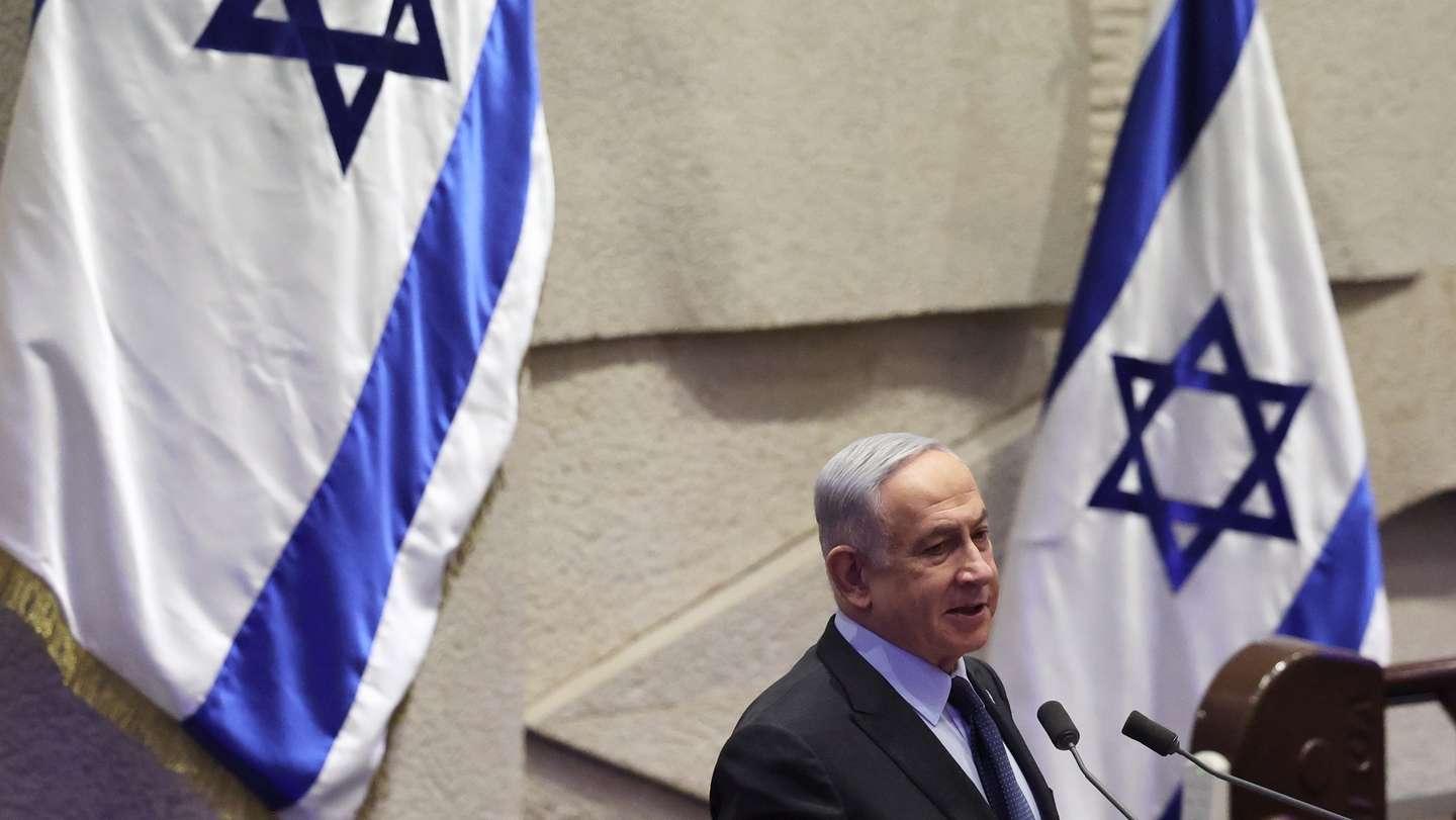 epa11166729 Israeli Prime Minister Benjamin Netanyahu speaks during the voting session for the impeachment of Hadash-Ta’al party MP Ofer Cassif in Jerusalem, 19 February 2024. The motion was brought up after Cassif publicly supported South Africa’s genocide case against Israel at the International Court of Justice (ICJ).  EPA/ABIR SULTAN