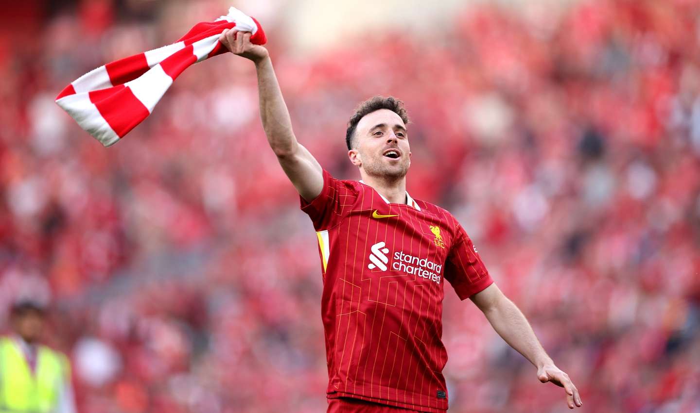 epa12059318 Liverpool player Diogo Jota celebrates in front of fans after the English Premier League soccer match between Liverpool FC and Tottenham Hotspur, in Liverpool, Britain, 27 April 2025. Liverpool won 5-1 to win their 20th English league title.  EPA/ADAM VAUGHAN EDITORIAL USE ONLY. No use with unauthorized audio, video, data, fixture lists, club/league logos, 'live' services or NFTs. Online in-match use limited to 120 images, no video emulation. No use in betting, games or single club/league/player publications.