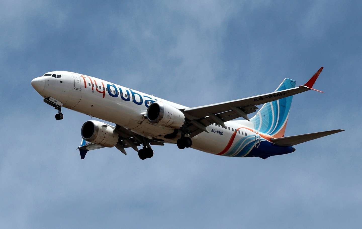 epa10576797 A Flydubai Airlines passenger plane prepares to land at Dubai International Airport, United Arab Emirates, 17 April 2023. An announcement by Emirates Airlines and Ffydubai extended the cancellation of their flights to and from Sudan until 30 April 'due to a deteriorating situation of civil unrest in Khartoum'. Heavy gunfire and explosions were reported in Sudan's capital Khartoum on 15 April between the army and a paramilitary group following days of tension centering around the country's proposed transition to civilian rule.  EPA/ALI HAIDER
