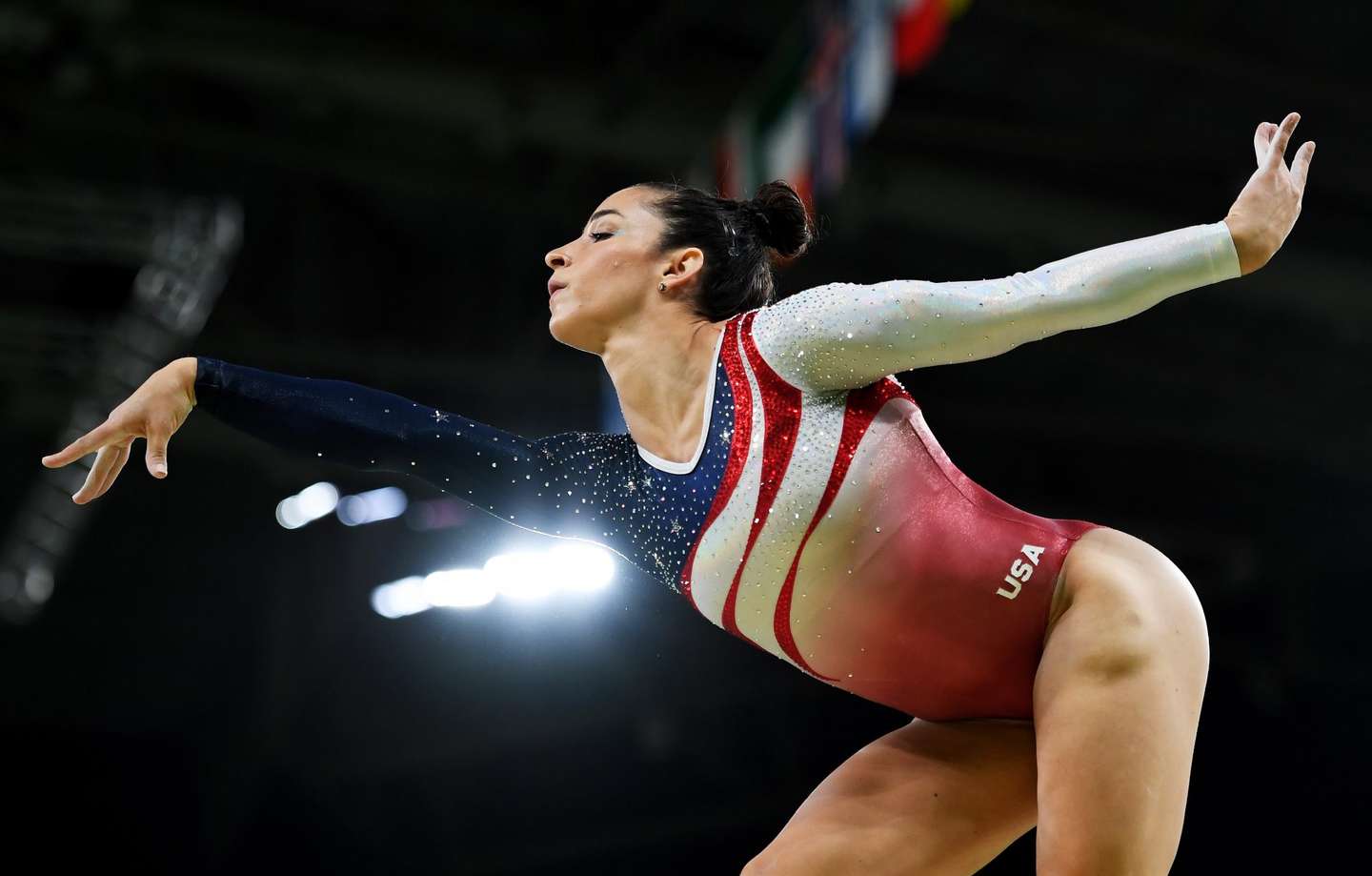 RIO DE JANEIRO, BRAZIL - AUGUST 09: Alexandra Raisman of the United States competes on the balance beam during the Artistic Gymnastics Women's Team Final on Day 4 of the Rio 2016 Olympic Games at the Rio Olympic Arena on August 9, 2016 in Rio de Janeiro, Brazil. (Photo by Laurence Griffiths/Getty Images)