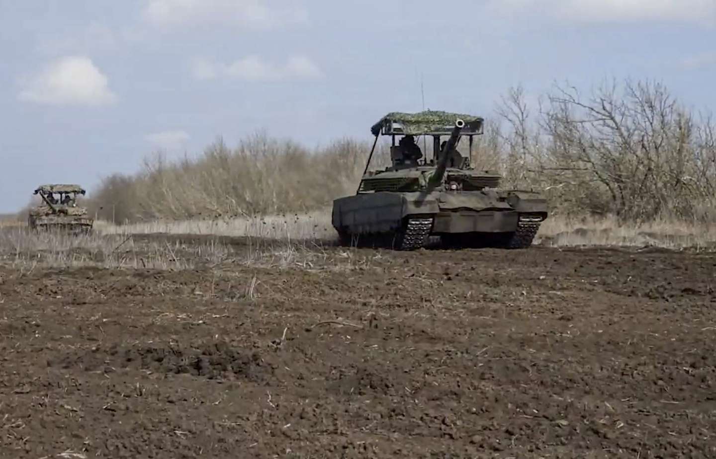 epa11255550 A handout still image taken from handout video provided 02 April 2024 by the Russian Defence ministry press-service shows Vostok troops operating a T-80BVM vehicle at an undisclosed location in the Donetsk region, Russian-controlled part of Ukraine. Russian Defense Minister Sergei Shoigu said that Russian forces delivered 190 combined strikes and two major strikes on Ukrainian targets in March 2024.  EPA/RUSSIAN DEFENCE MINISTRY PRESS HANDOUT HANDOUT EDITORIAL USE ONLY/NO SALES HANDOUT EDITORIAL USE ONLY/NO SALES HANDOUT EDITORIAL USE ONLY/NO SALES