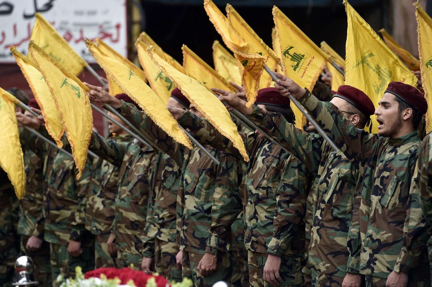 epa11331757 Hezbollah militants take the oath during the funeral of late Hezbollah fighter Hussein Ahmed Hamdan in Beirut, Lebanon, 10 May 2024. According to the Lebanese military, three Hezbollah fighters and a civilian were killed on 09 May in an Israeli airstrike in Lebanon's southern village of Bafliyeh in the district of Tyre.  EPA/WAEL HAMZEH