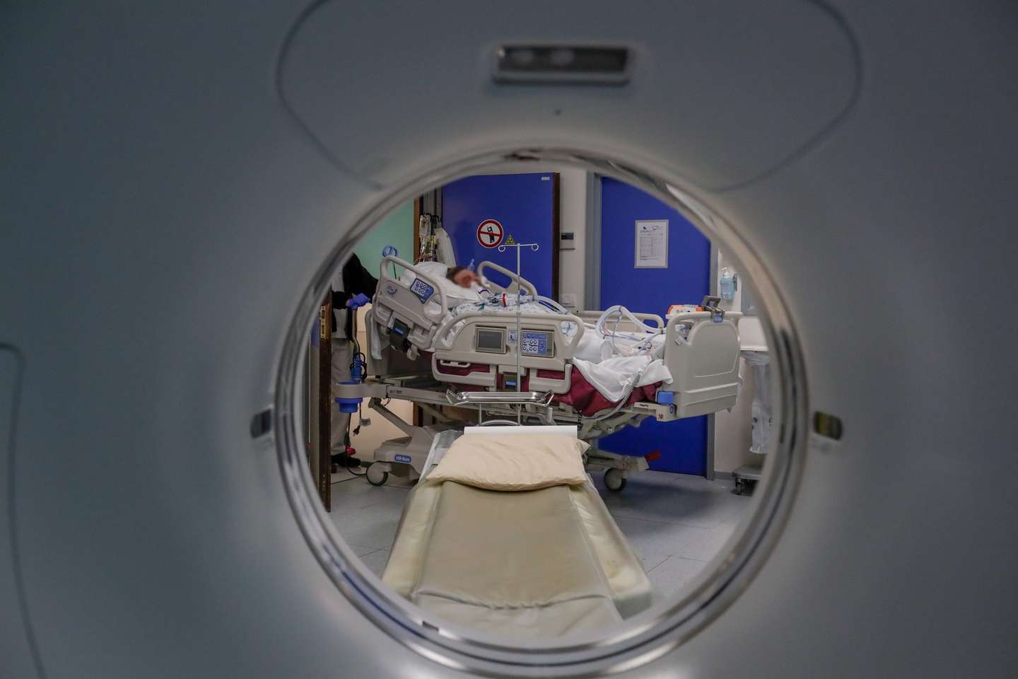 epa08392180 A COVID-19 patient is cared for by the nursing staff in order to perform a lung scan at the Etterbeek-Ixelles site of the Iris Sud Hospitals in Brussels, Belgium, 29 April 2020. Countries worldwide increased their measures to prevent the widespread of the SARS-CoV-2 coronavirus which causes the COVID-19 disease while crucial businesses like grocery stores, pharmacies, public transportation and health services are still open.  EPA/STEPHANIE LECOCQ
