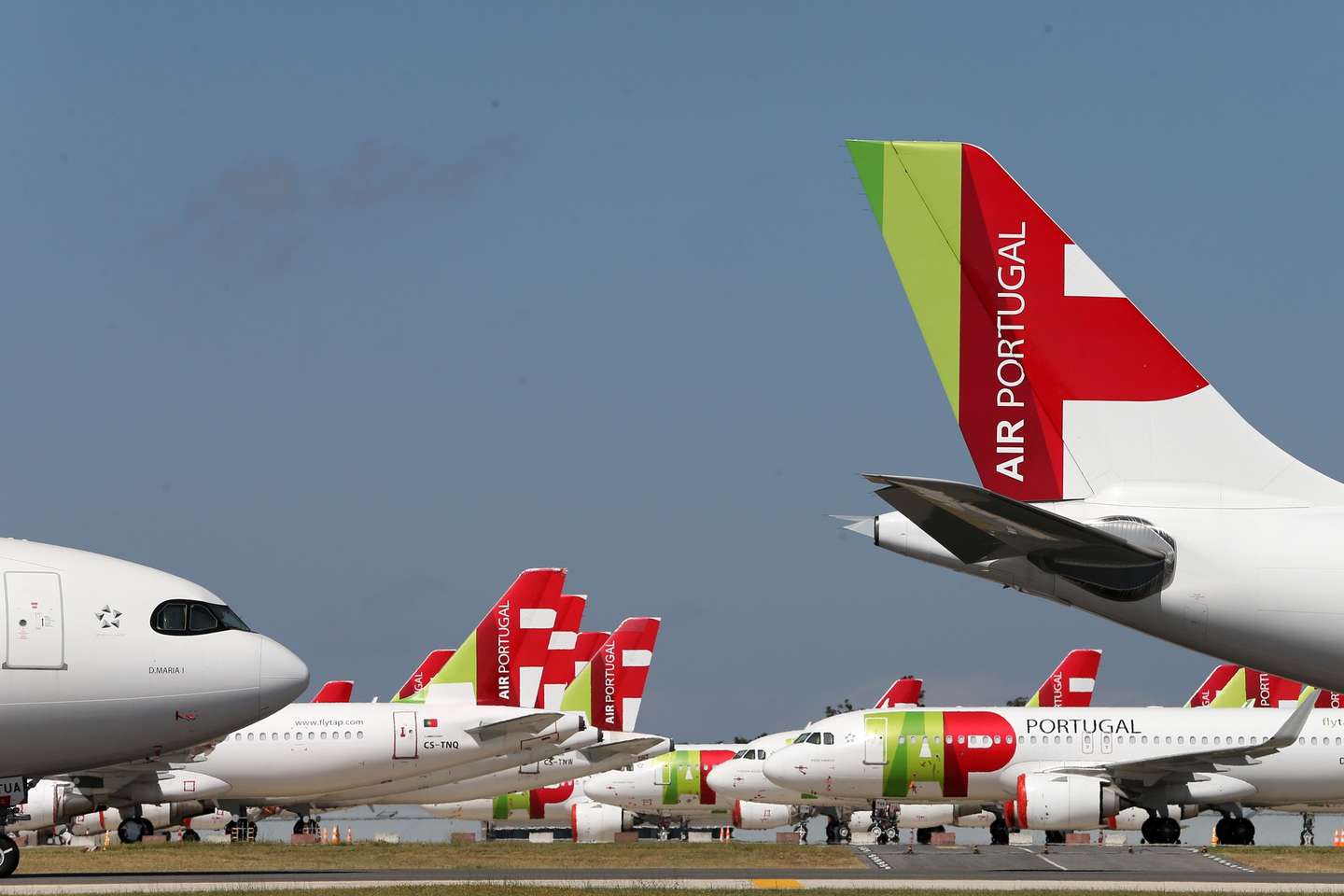 File photo dated from 09 April 2020 of TAP Air Portugal aircraft grounded at Humberto Delgado airport closed for passenger traffic as part of the exceptional traffic measures to combat the epidemiological situation of Covid-19, in Lisbon, Portugal, 09 April 2020 (reissued 02 July 2020). The granting of state support to TAP has been under discussion since the airline's activity came to a standstill because of the coronavirus pandemic, with an agreed injection of up to 1,200 million euros. MARIO CRUZ/LUSA