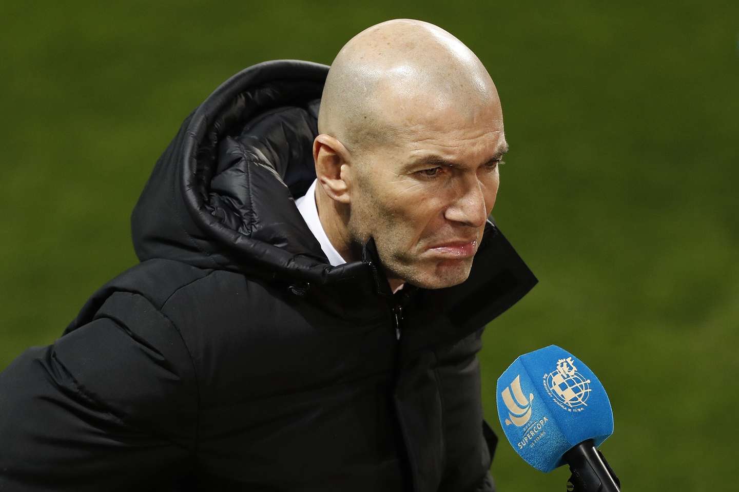 epa08938152 Real MadridÂ´s head coach Zinedine Zidane talks to the media after the Spanish Supercup semi final match between Real Madrid and Athletic Club de Bilbao at La Rosaleda stadium in Malaga, Andalusia, Spain, 14 January 2021.  EPA/Jorge Zapata