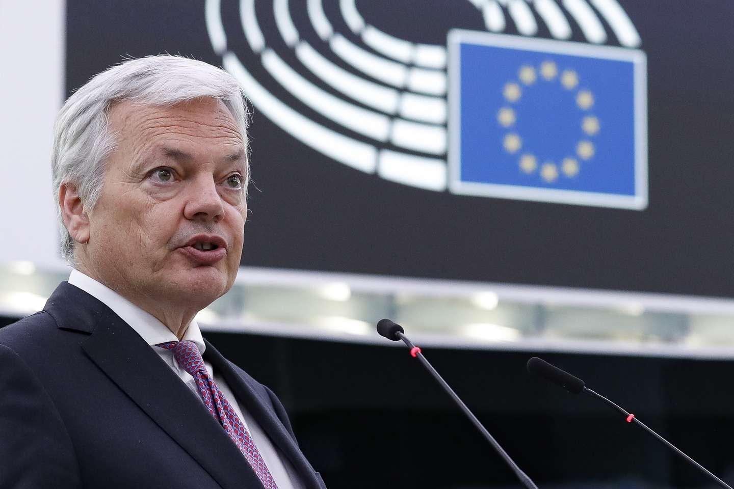 epa09924359 European Commissioner for Justice Didier Reynders delivers a speech on the ongoing hearings under Article 7(1) TEU regarding Poland and Hungary, at the European Parliament in Strasbourg, France, 03 May 2022.  EPA/JULIEN WARNAND
