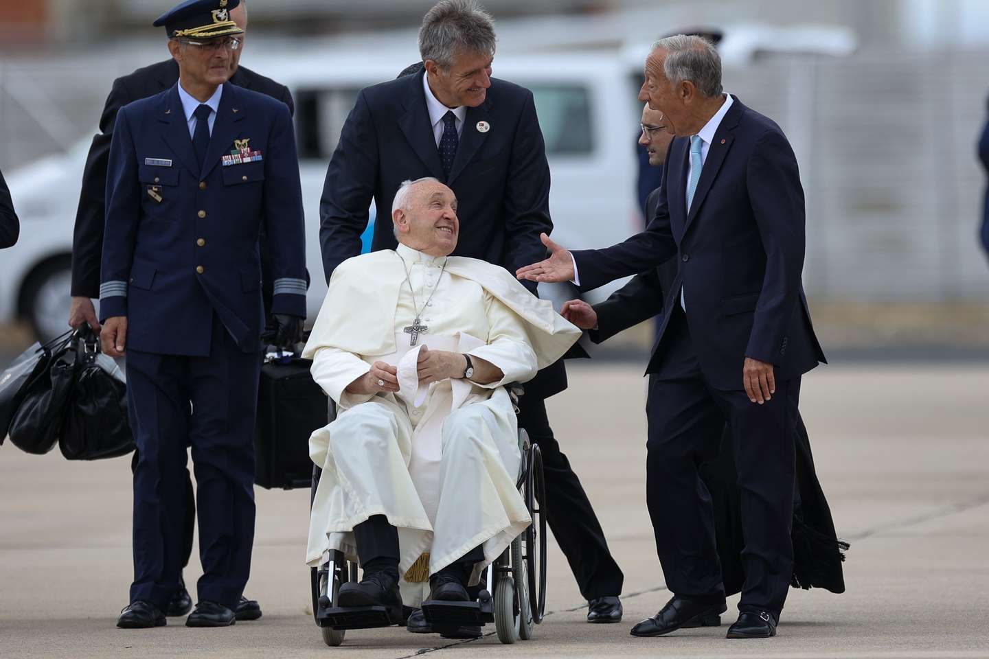 Pope Francis upon his arrival at Figo Maduro airbase is welcomed by Portugal's Presidente Marcelo Rebelo de Sousa (R) in Lisbon, Portugal, 02 August 2023. The Pontiff will be in Portugal on the occasion of World Youth Day (WYD), one of the main events of the Church that gathers the Pope with youngsters from around the world, that takes place until 06 August. ANTONIO COTRIM/LUSA/POOL