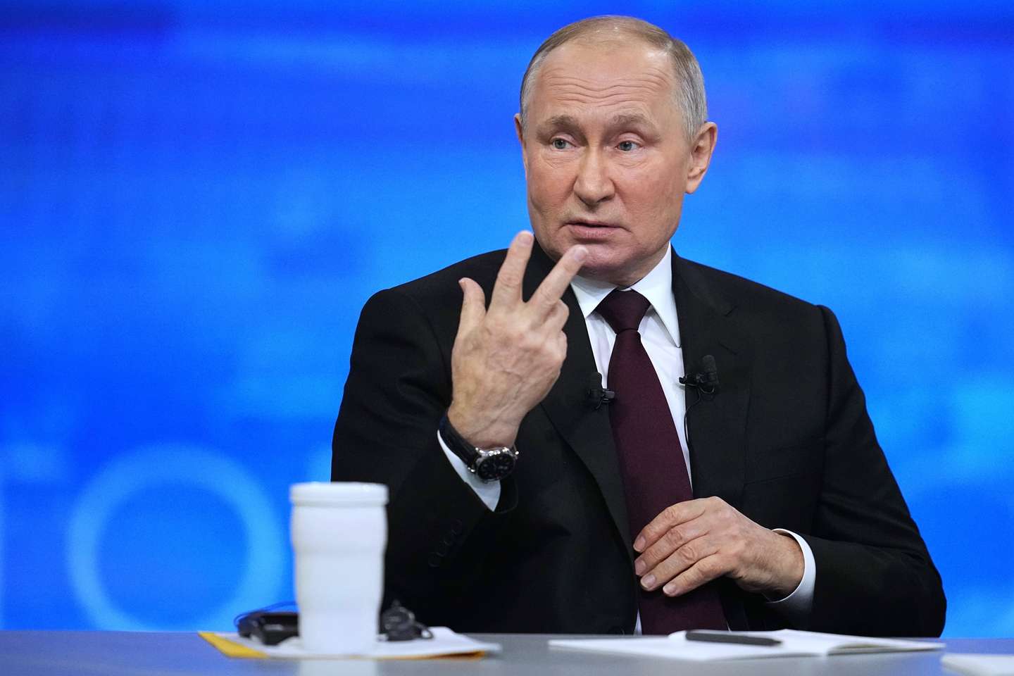 epa11028707 Russian President Vladimir Putin gestures as he answers questions during his annual press conference with Russian federal, regional, and foreign media at the Gostiny Dvor forum hall in Moscow, Russia, 14 December 2023. Russian President Vladimir Putin on 14 December holds his end-of-year press conference, followed by the 'Direct Line with Vladimir Putin' televised event, where he will answer citizens' questions focusing on domestic issues. The President's Big Press Conference is an annual event that has been held since 2001. This year the format is combined 'Direct Line' (questions from citizens) and 'Big Press Conference' (questions from journalists). The event takes place months before the presidential election scheduled for 17 March 2024, in which Putin decided to run for re-election.  EPA/ALEXANDER ZEMLIANICHENKO / POOL